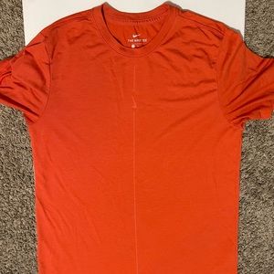 Orange Nike Dri-fit shirt